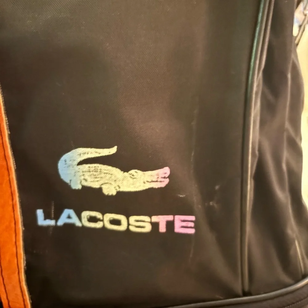 Vintage rare Lacoste messenger laptop bag with wheels
